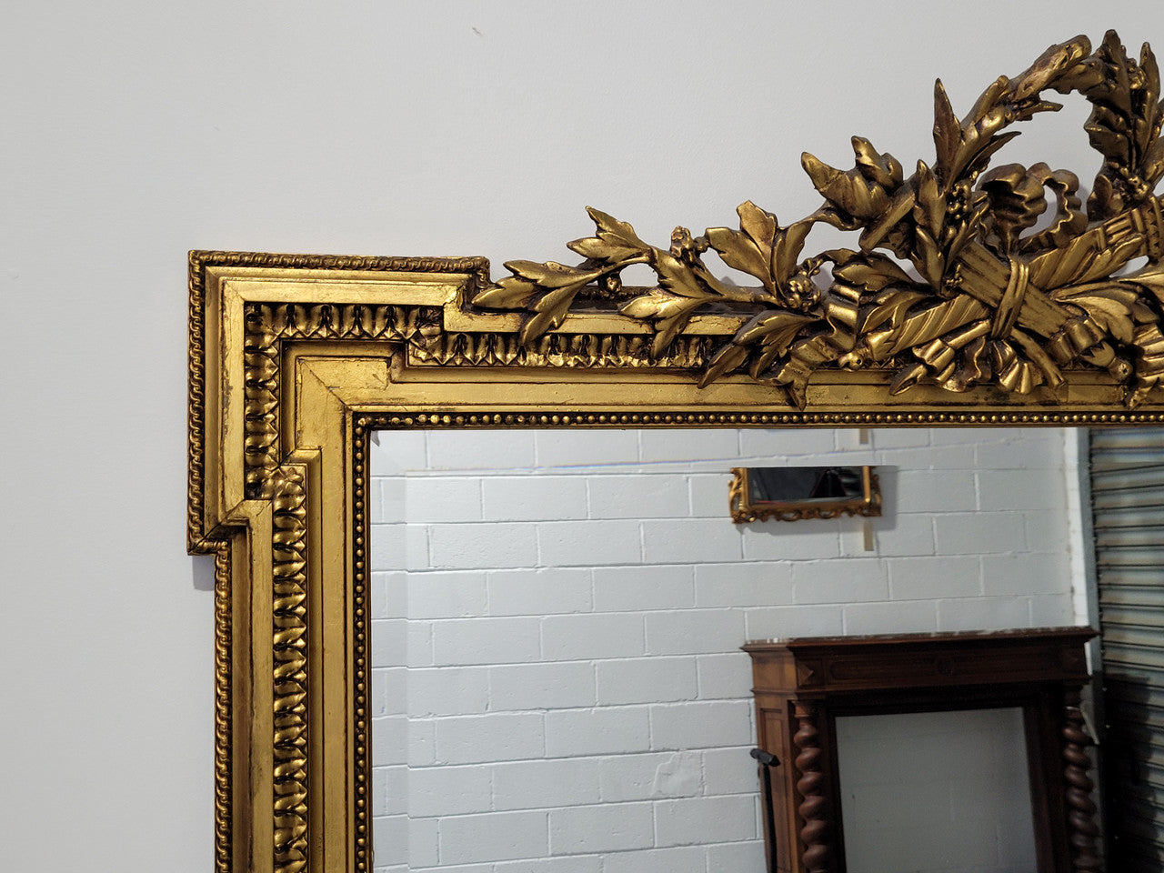 Substantial Louis XI style French Antique over mantel mirror. It is in very good restored condition.