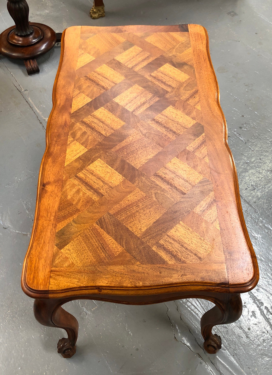 French Walnut parquetry top coffee table. In good original detailed condition. Circa: 1950's