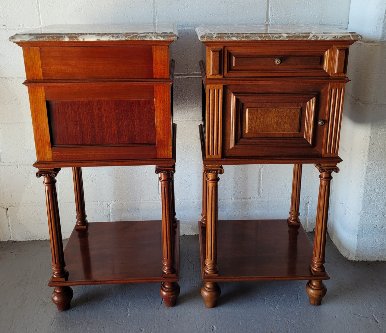 Pair of Henry II style Walnut bedside cabinets with a marble top. Circa 1920s and in good original condition.