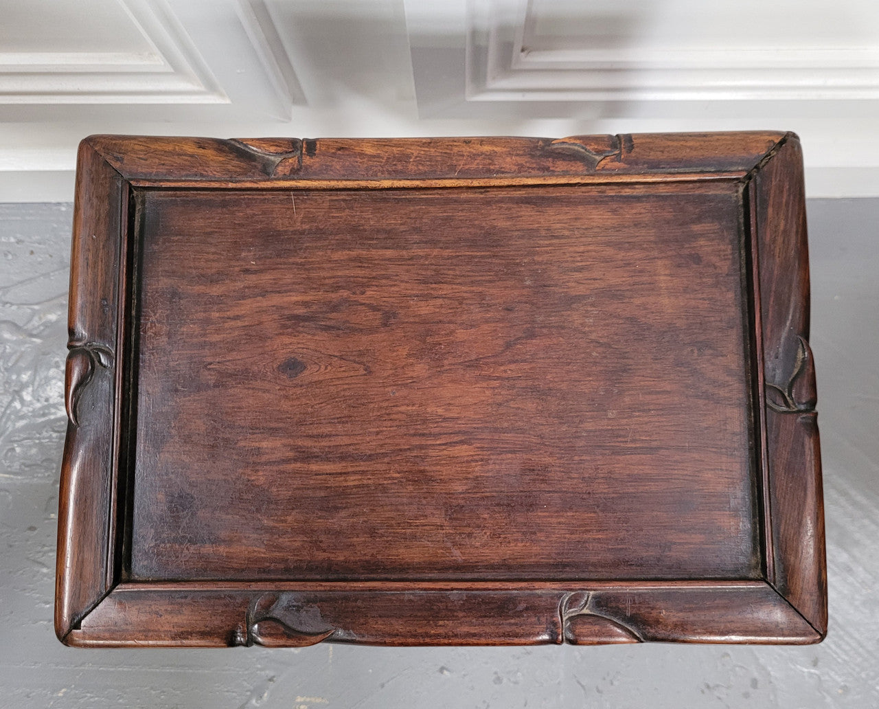 Chinese Rose wood occasional table. Nicely carved and could be used as a coffee table or and occasional table. It is in good original condition.