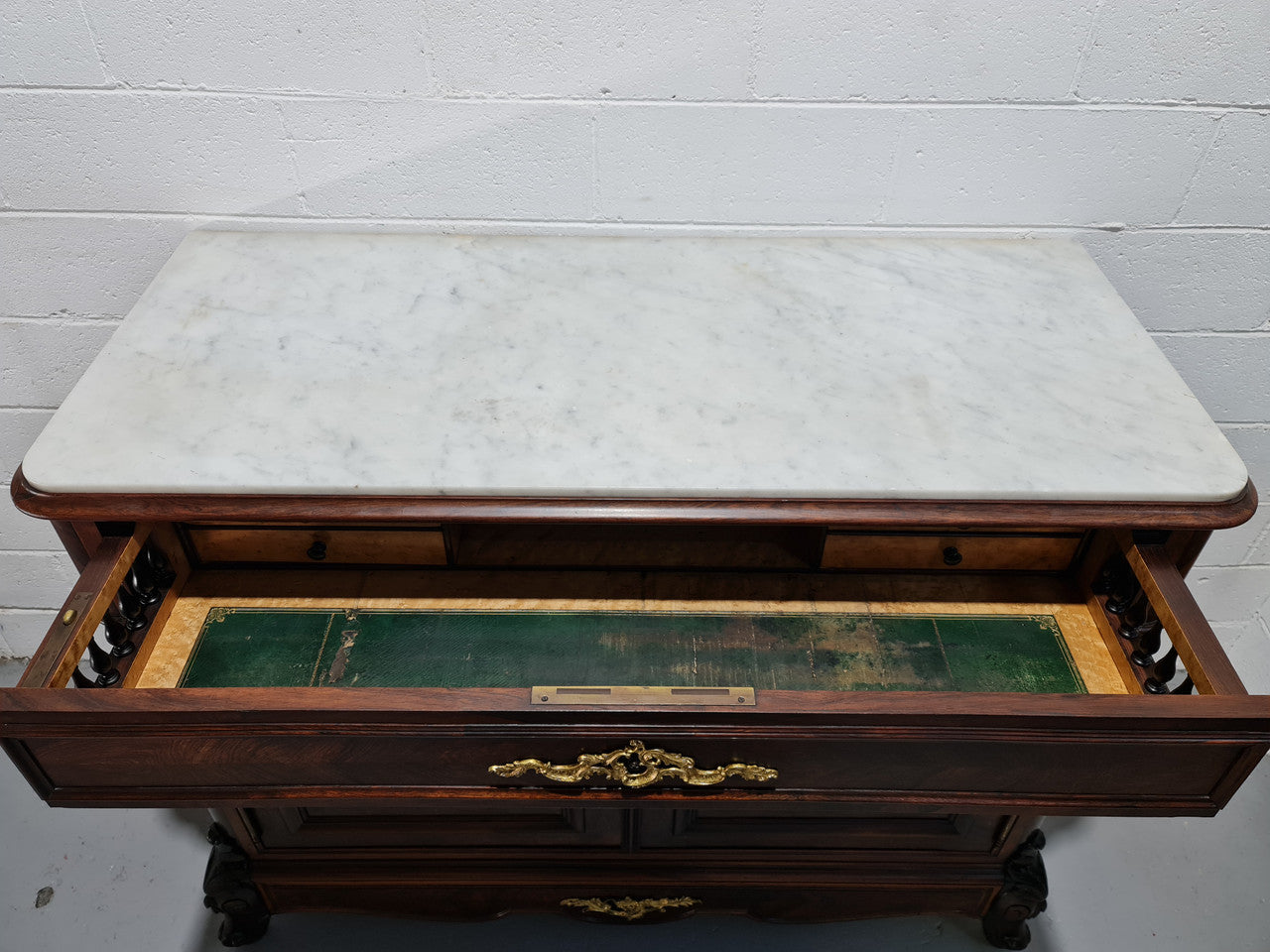 Stunning Rosewood Marble Topped Secretaire with two cupboards. Cupboards open to three fitted drawers and an additional secret drawer beneath the cupboard. All sitting on lovely carved legs and decorated with ormolu mounts. Circa: 1860. In good original detailed condition.