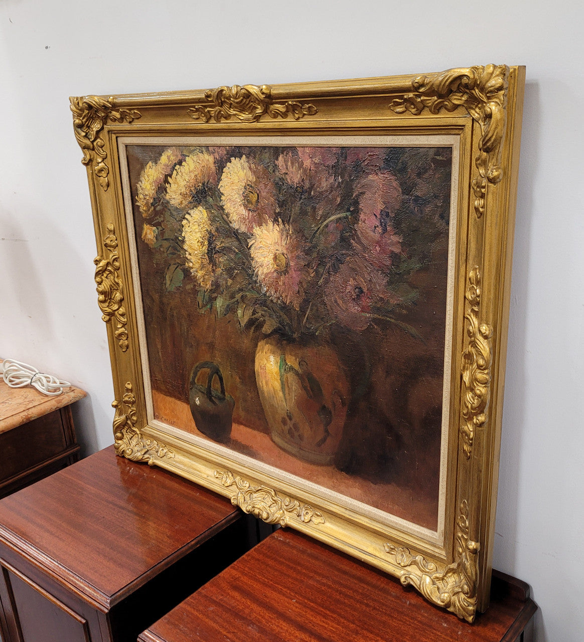 French signed oil on canvas depicting floral still life in charming gilt frame. Sourced from France and in good original detailed condition.