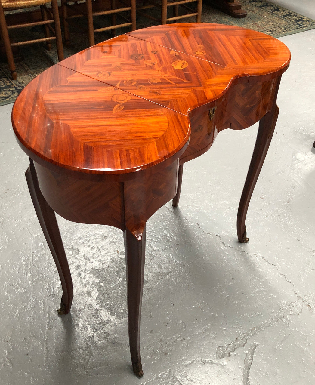 French Mahogany hidden dressing table with beautiful marquetry inlay. In good restored condition. Circa: 1950's