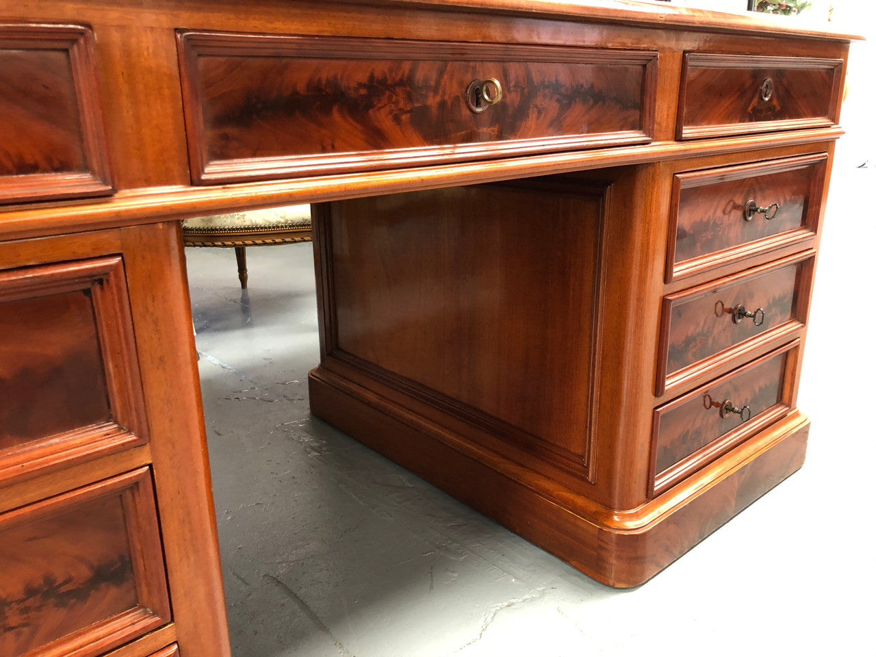 Antique French Mahogany and leather inset top double pedestal partners desk. Plenty of storage space with 9 long drawers on one side and space for someone to sit on the other side. In good restored condition. Circa 1880's.