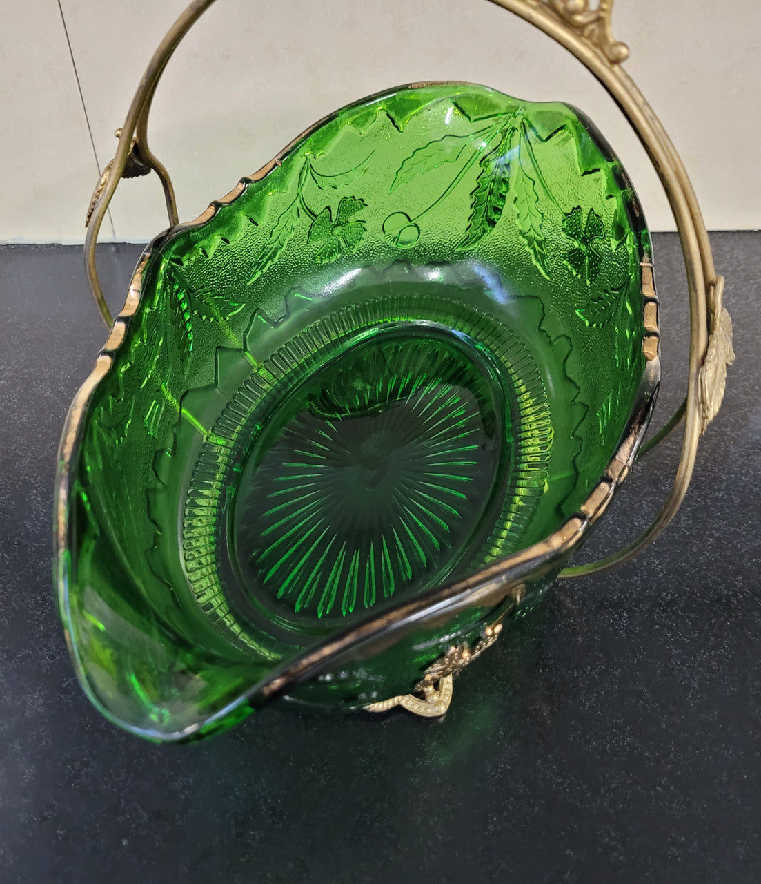 Victorian emerald green and gilt decorated glass bowl with ornate gilt metal stand. It is in good original condition, please view photos as they help form part of the description.