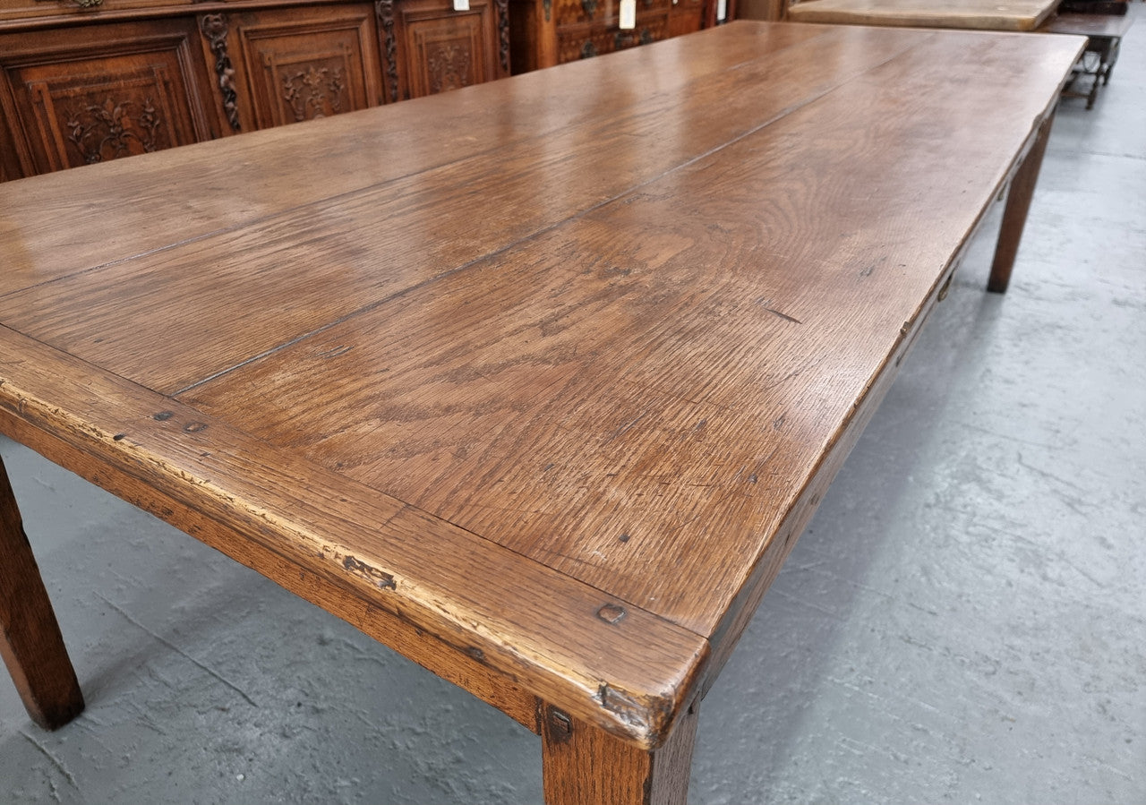 Amazing 19th Century French Oak Farmhouse Style Dining Table with three drawers. It is made from 3 large planks of wood which is very hard to find. 105.5 cm wide.