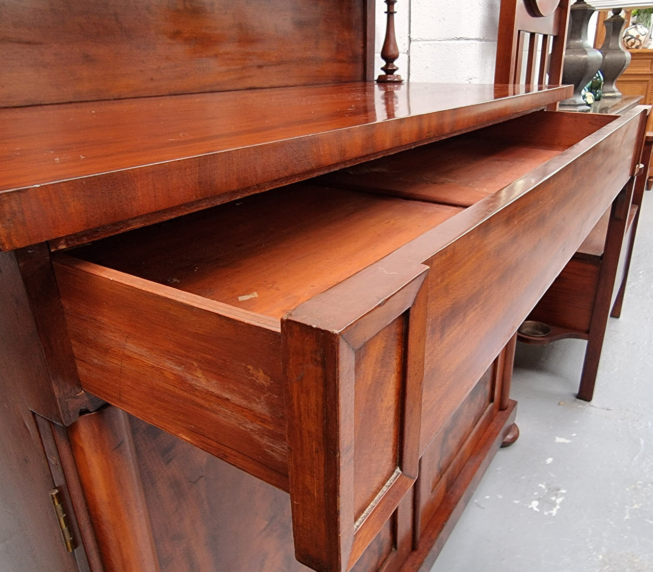 Beautiful Antique Rosewood Chiffonier with a cupboard, two doors and a drawer for all your storage needs . In good original detailed condition.