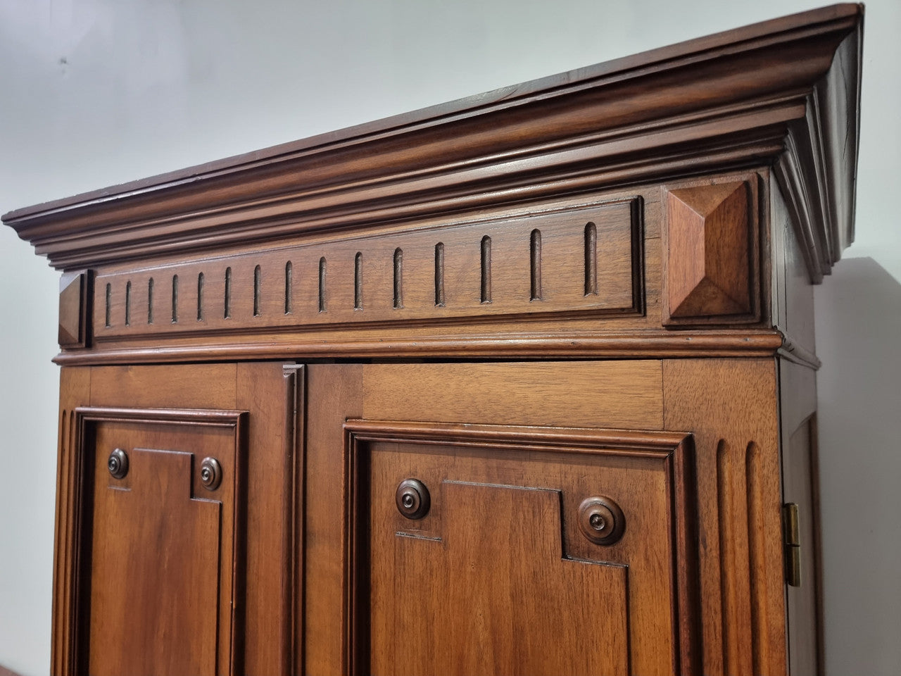 French Henry II style Walnut linen storage cupboard with nine pull out shelves. This piece could be very functional for a range of different purposes including shoe storage. It is in good original detailed condition, please note the door lock no longer functions and opens by pulling the door.