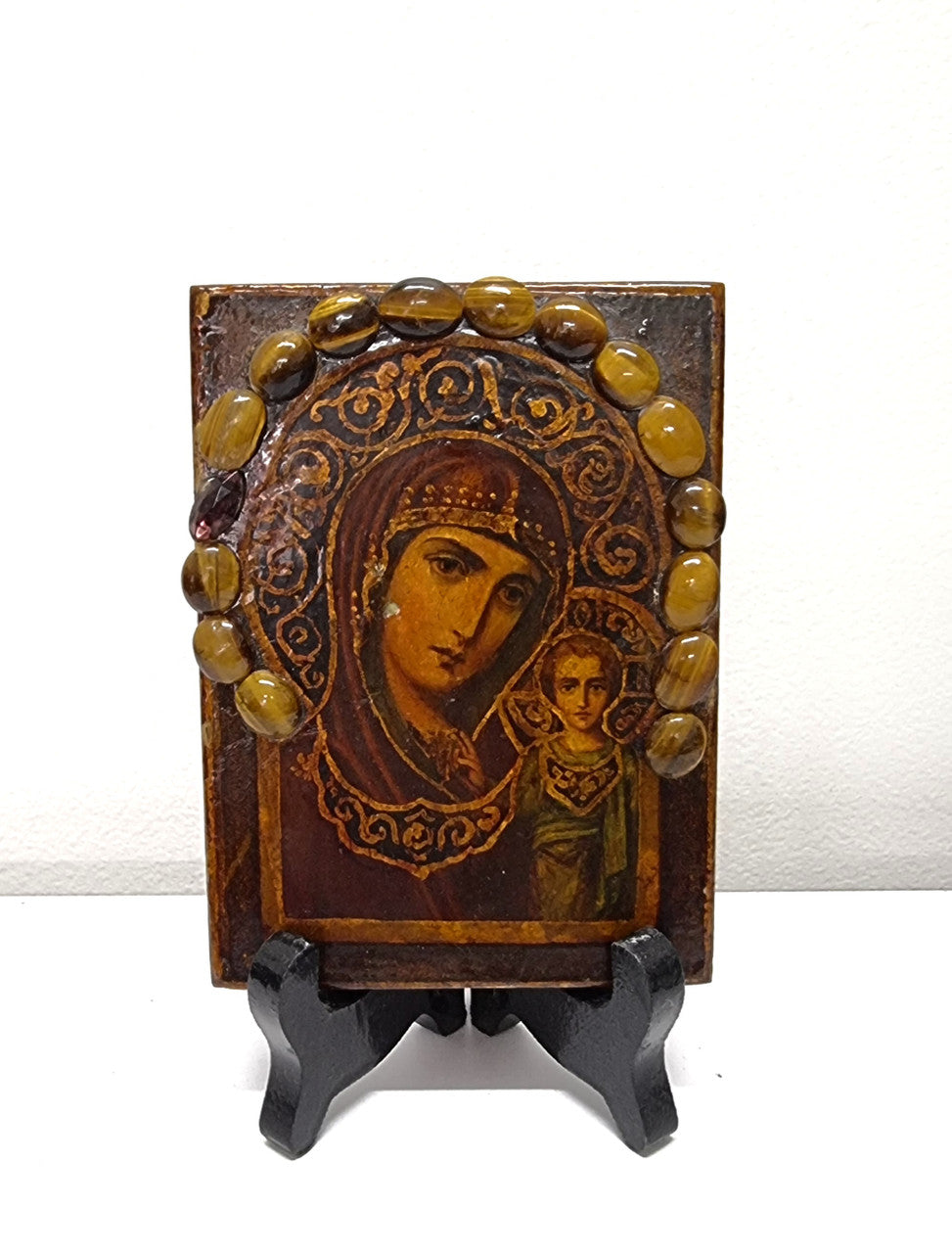 Unique hand painted Russian icon with tiger eye decoration. It is in good original condition. Please view photos as they help form part of the description.