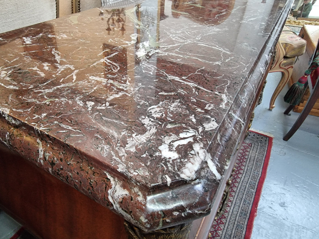 French Louis XVI style three drawer commode with amazing coloured marble. It has decorative brass mounts and is in very good original detailed condition.