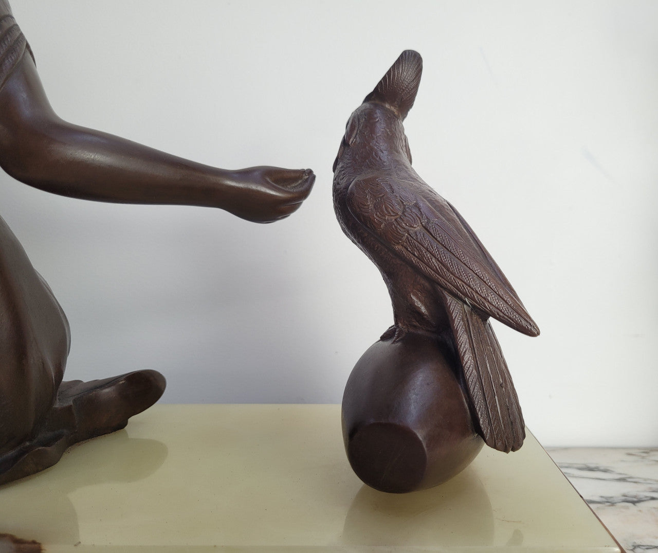 Art Deco bronze statue with brown patina of a lady and parrot on marble base. Signed by Italian Sculptor A Trefolini, an highly regarded sculptor, in very good condition.