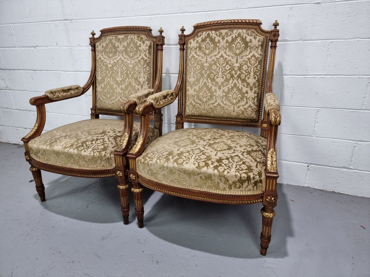 Beautiful French walnut Louis XVI style upholstered three piece Salon Suite. It has lovely fabric which is in overall good condition and is very comfortable to sit in. In good original detailed condition.