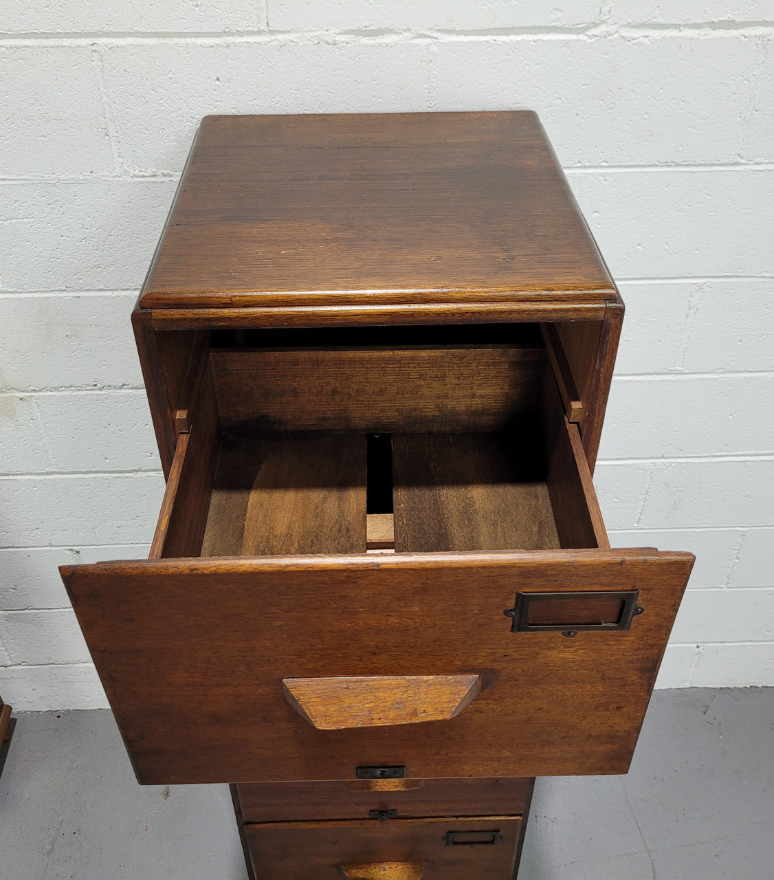 Blackwood four drawer filing cabinet in good original detailed condition.