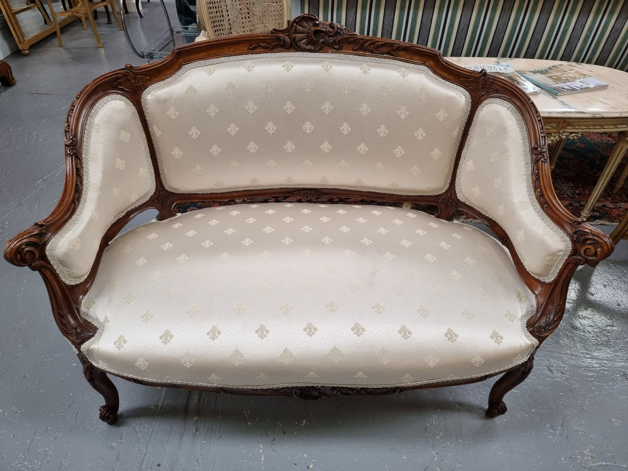 Pretty French Louis XV style small Walnut settee with very good upholstery. Sourced from France and in good original condition, please view photos of the upholstery as it helps form part of the description.