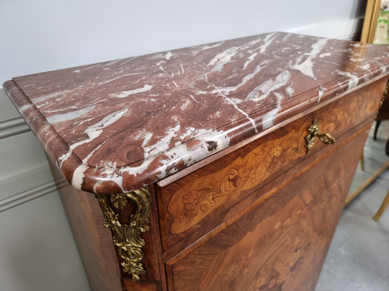 Elegant French transitional style Walnut & Kingwood Salon cabinet. It has beautiful marquetry inlay, a marble top and decorative ormolu mounts. Sourced From France and is in good original detailed condition.