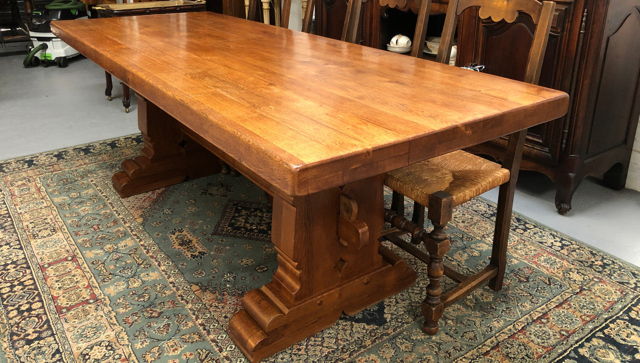 French Farmhouse table with a beautiful thick plank top and stretcher base. Can seat 8-10 people comfortably and is in good original detailed condition.