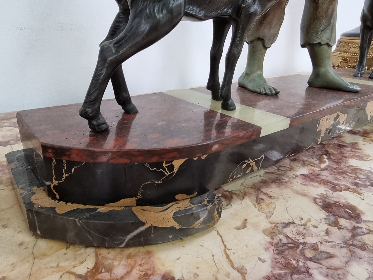 French Art Deco spelter and marble statue of a boy and two deers in good original condition.