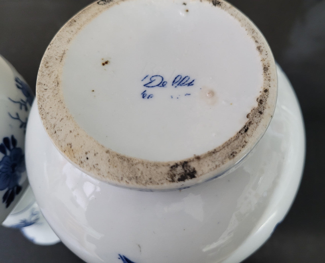 Pair of Victorian delft blue hand painted vases. Stamped underneath and one featuring a ship scene and the other a windmill scene. Please note the windmill vase does have a hairline crack at the top otherwise in good condition, please view photos as they help form part of the description.