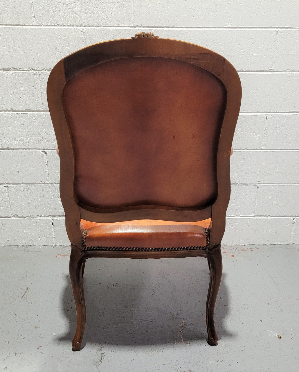 French Walnut Louis XV style desk chair with faux leather upholstery. The upholstery is in good original condition and very comfortable to sit in.