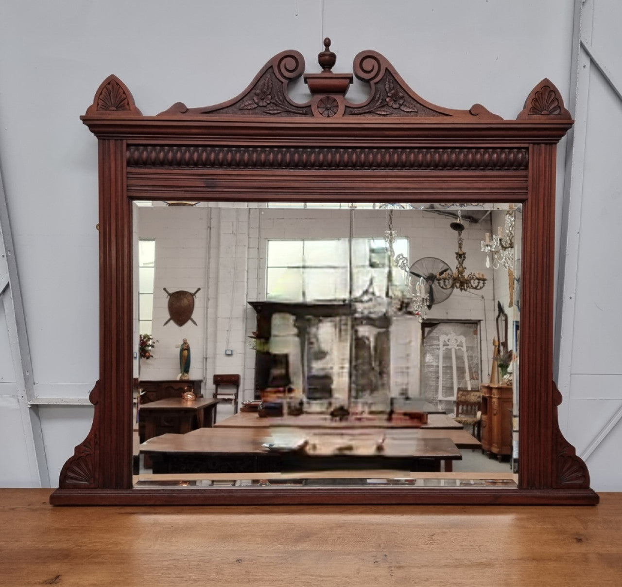 Beautiful Walnut nicely carved Edwardian mantle mirror. In good original condition and still has its original mirror.