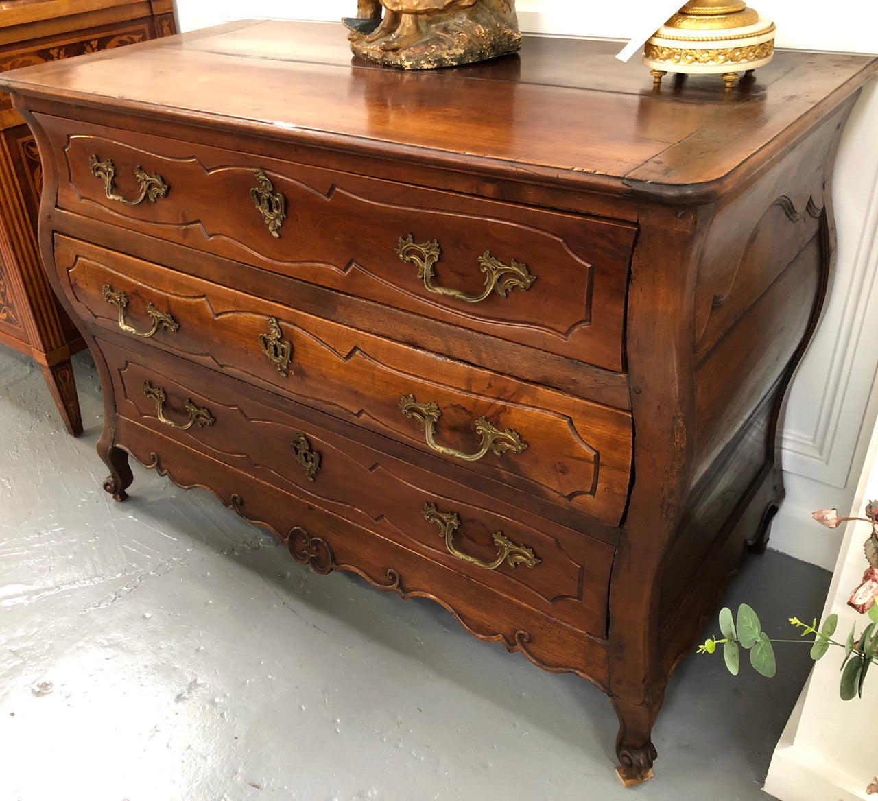 Beautiful 18th Century French all Cherrywood three drawer commode with beautiful ormolu mounts and handles. It is in good original detailed condition.