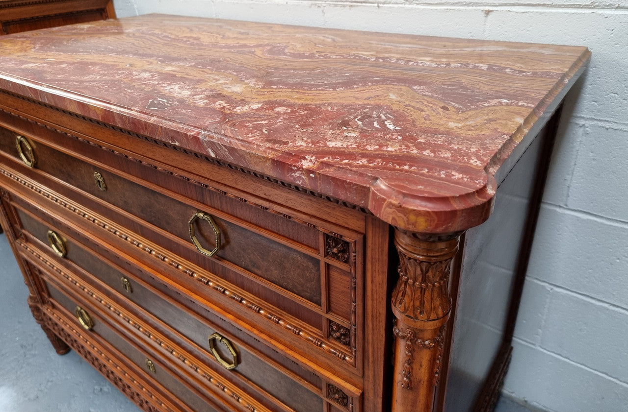 Lovely decorative French walnut and burr Walnut 3 drawer commode with a stunning coloured marble top and lovely carved details. In very good detailed condition.