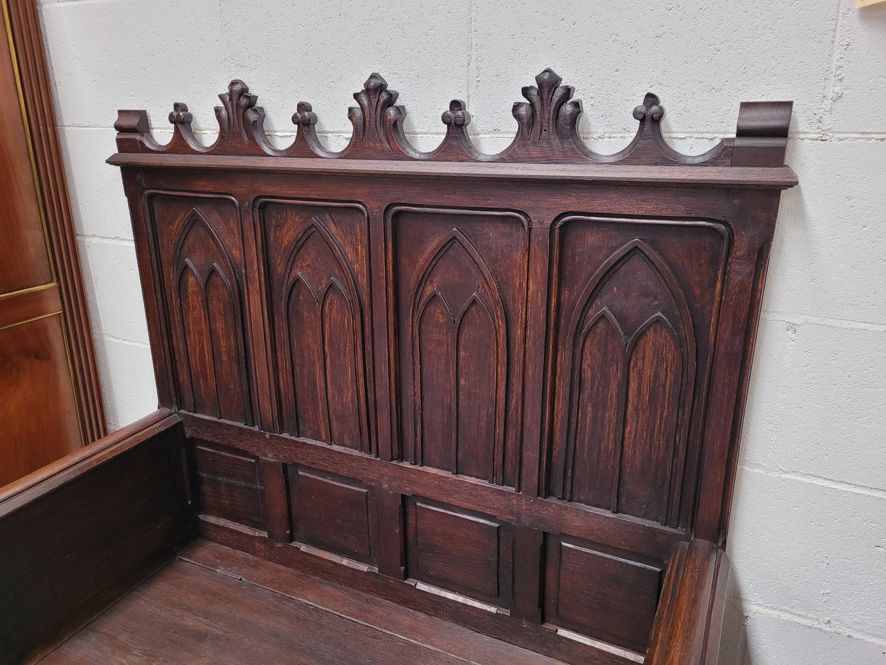 French Oak 19th Century gothic style high backed hall seat. Amazing detailed carving and is good detailed condition.