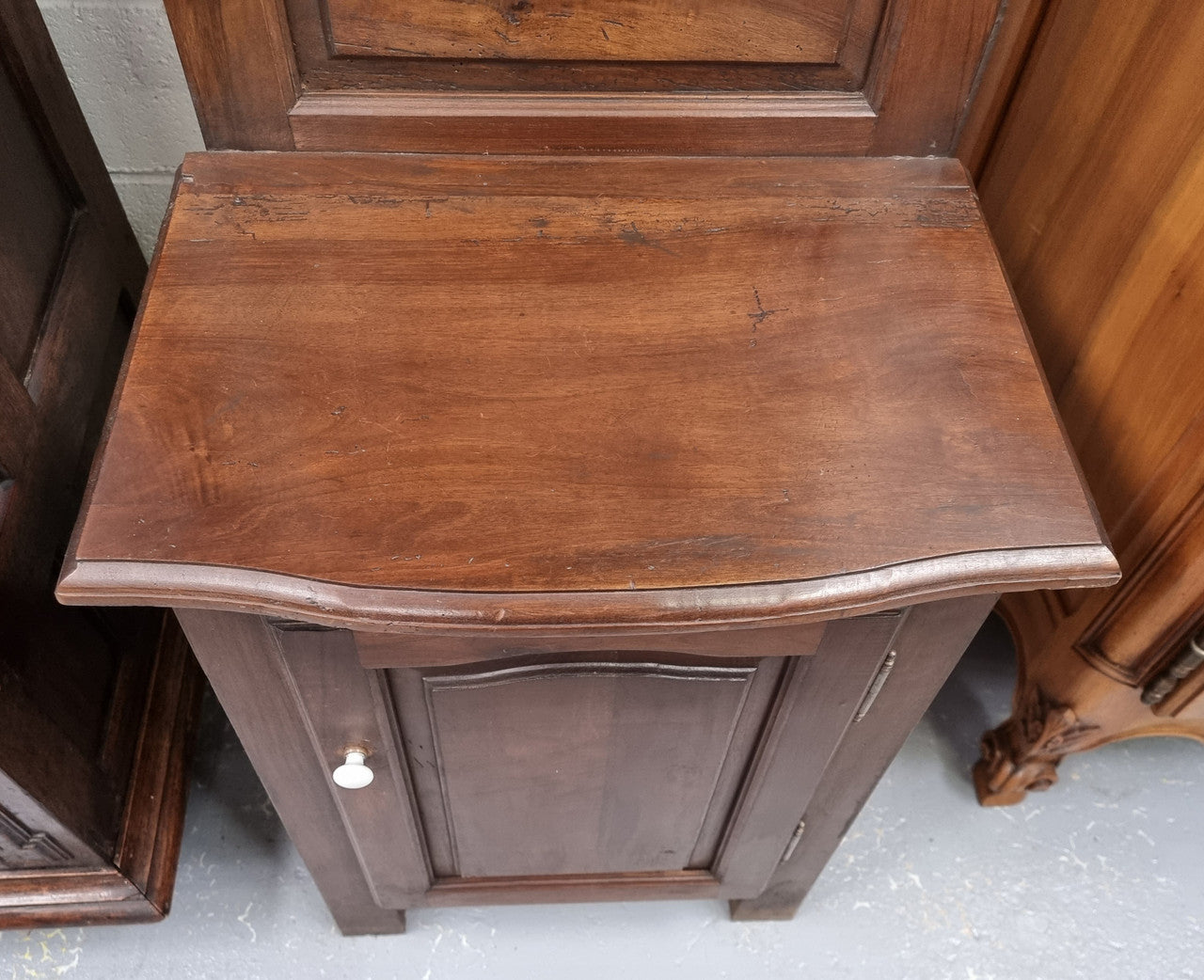 Lovely entrance piece with shelf and single door cupboard, topped with a section for hanging jackets, hats etc. Sourced from France and in good original detailed condition.