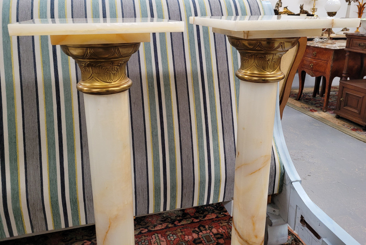 Pair of Imposing French alabaster marble and bronze pedestals. They are highly decorative and have been sourced from France. They are in good original detailed condition.