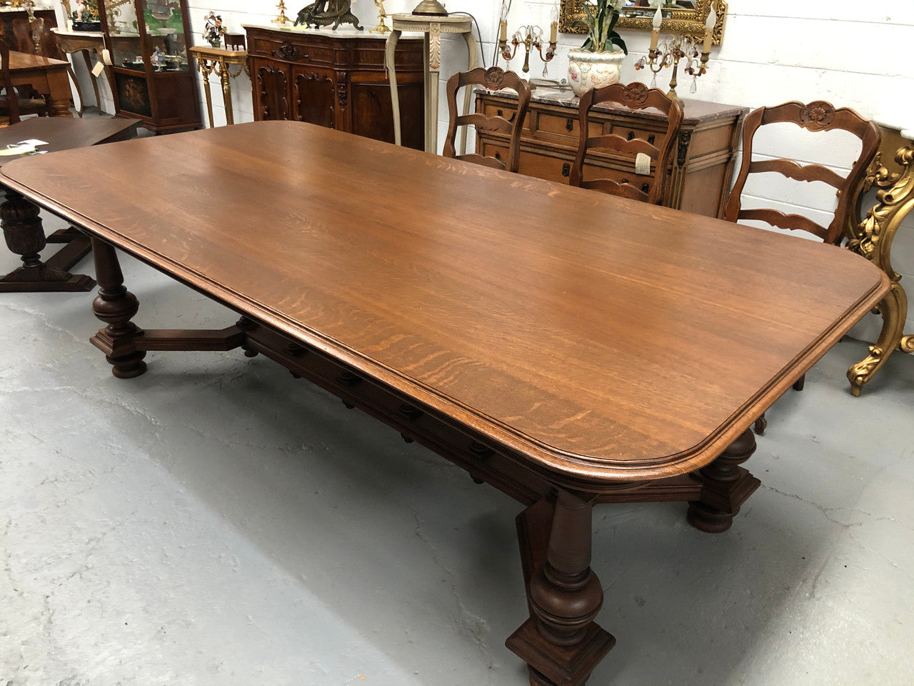 Large French Oak 19th century Henry II style dining table. It can seat 8 very comfortable and being very wide at 119 cm there is plenty of space to sit 10. In good original detailed condition.