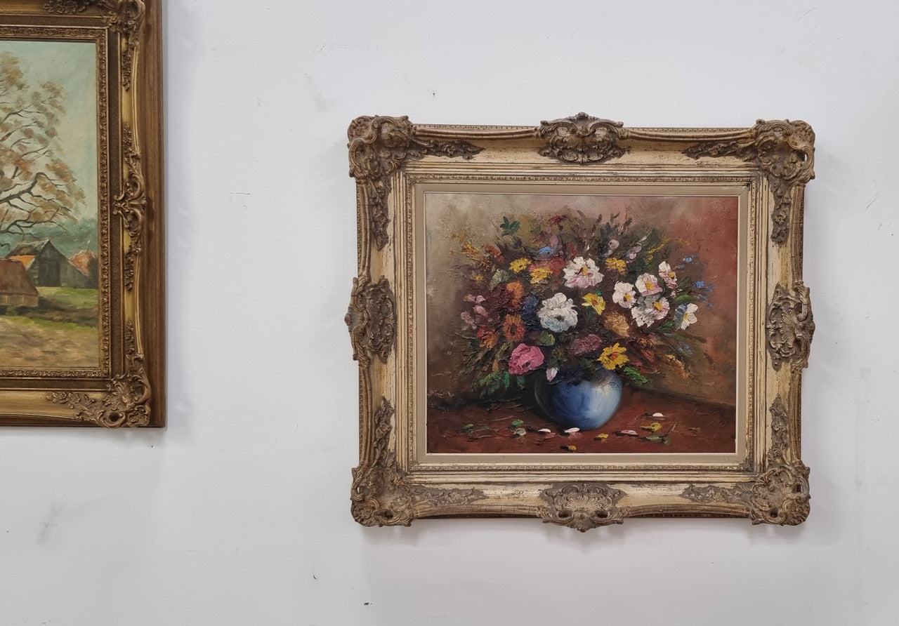 A beautiful sourced in France Floral oil on canvas in an ornate decorative frame. In good original detailed condition.