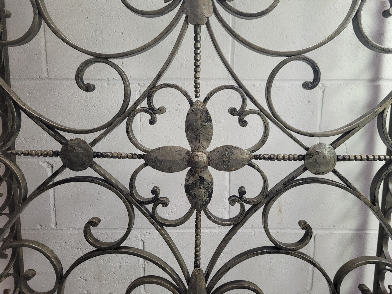 Stunning Art Deco wrought iron and marble top console table. It has amazing decorative iron work at the bottom and a beautiful marble top. It is in good original detailed condition.