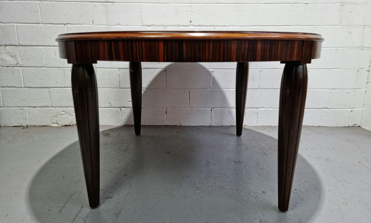 French Art Deco Macassar Ebony circular dining table by "Jules Leleu". In very good original detailed condition.
