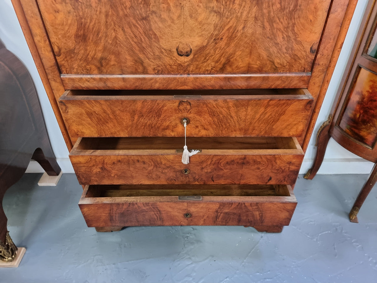 Fabulous 19th Century French Oyster Veneer and walnut abbattant with a lovely marble top, tooled leather work section and two secret drawers. There are also four larger drawers for storage and it is in good original detailed condition.