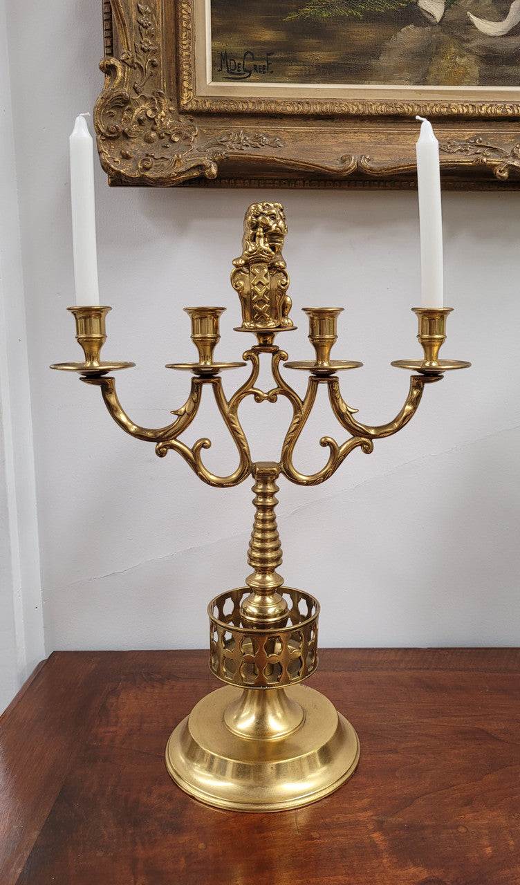 Pair of large Antique French Brass candelabras with lions. They have been sourced from France and are in good original detailed condition.