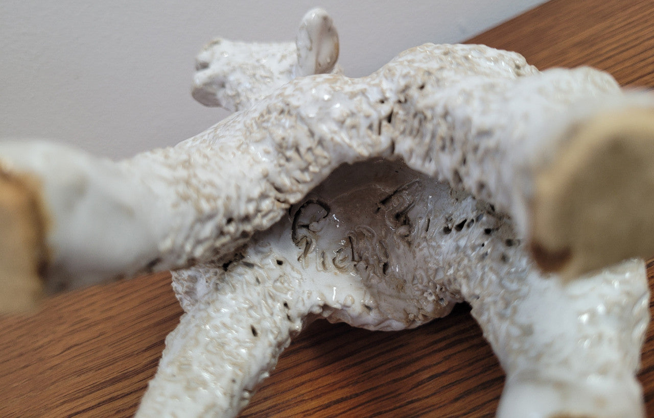 Hand Made Glazed Terra Cotta Sheep signed “Giel”. In good condition.