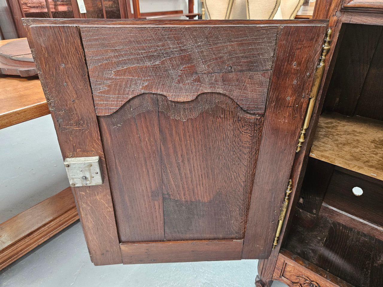 Louis 15th style oak 19th century cabinet with lovely brass hinges, handles & charming carving. Circ: 1860's. In good original condition.