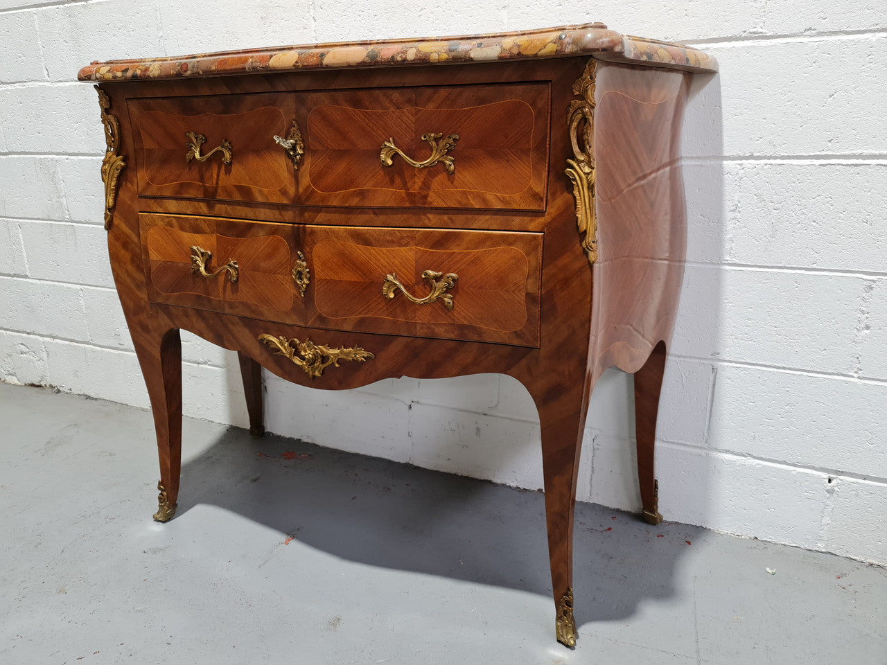 High quality French Mahogany Louis XVth style marble top commode. It has an eye catching marble top and is signed on body "J Bamelis". In very good original detailed condition.