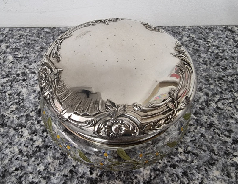 Silver lidded dressing table powder/trinket bowl with beautifully hand-painted floral enamel. In good condition please view photos as they help form part of the description.