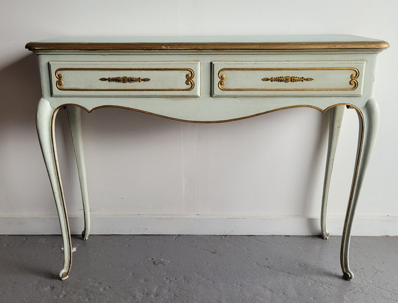 Vintage French Louis 15th style original painted and gilded highlights two drawer console table. It has been sourced from France and is in good original condition.