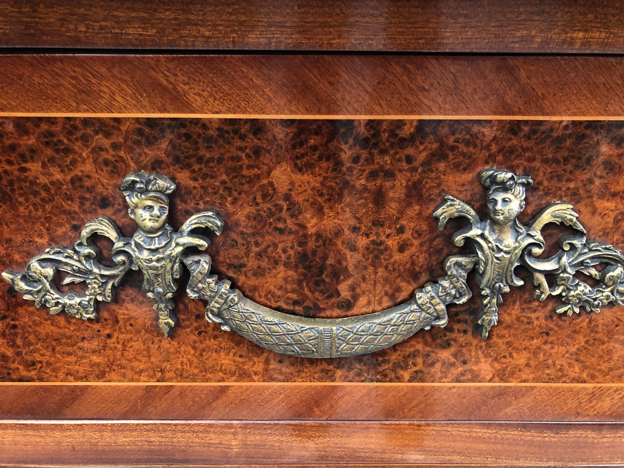 Grande French Louis XIV th style Amboyna and walnut two drawer marble top commode, with amazing detailed ormolu mounts, and sienna colour marble top. In good original detailed condition.Grande French Louis XIV th style Amboyna and walnut two drawer marble top commode, with amazing detailed ormolu mounts, and sienna colour marble top. In good original detailed condition.