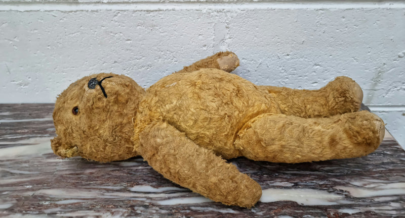 Part of a huge collection is this Beautiful old vintage teddy bear in original condition. The growler is not working but his just gorgeous anyway.