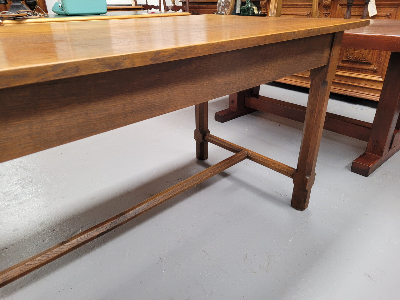 Stunning French oak stretcher base table, that has been sourced from France. It is in good original condition. Please see pictures to form part of the description.