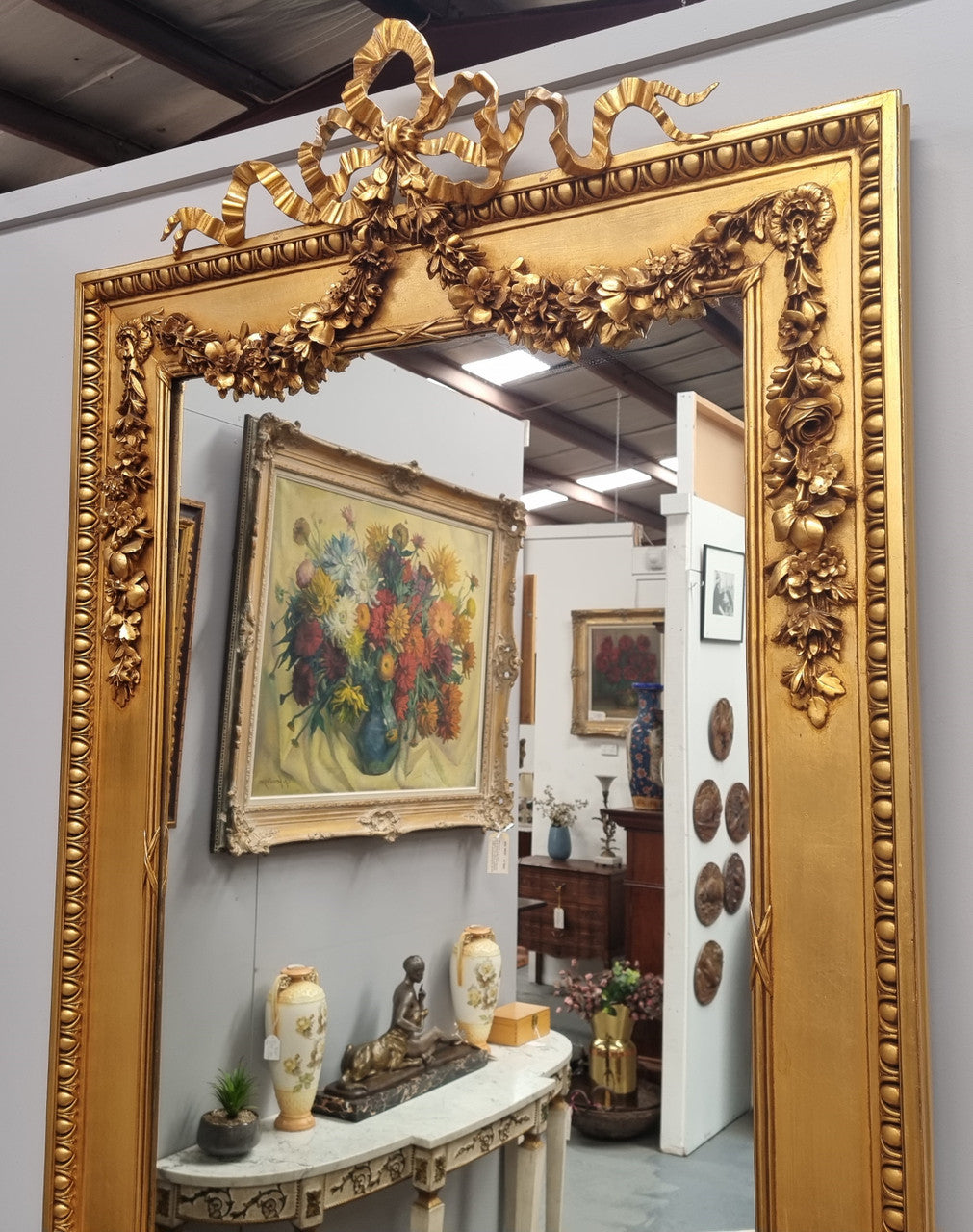 Stunning Vintage French floral gilt framed overmantel mirror. It has been sourced from France and is in good original detailed condition.