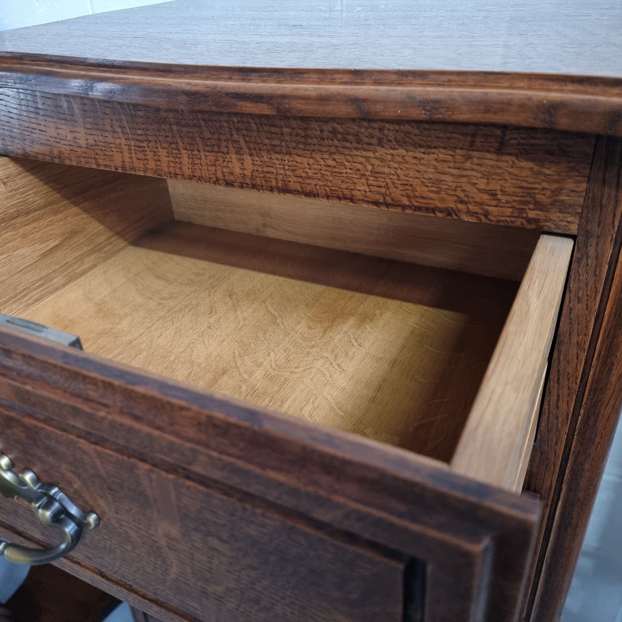 Elegant French Oak Louis XV style four drawer chest of drawers. It has lovely carvings and it is in good original detailed condition. It has been sourced from France.