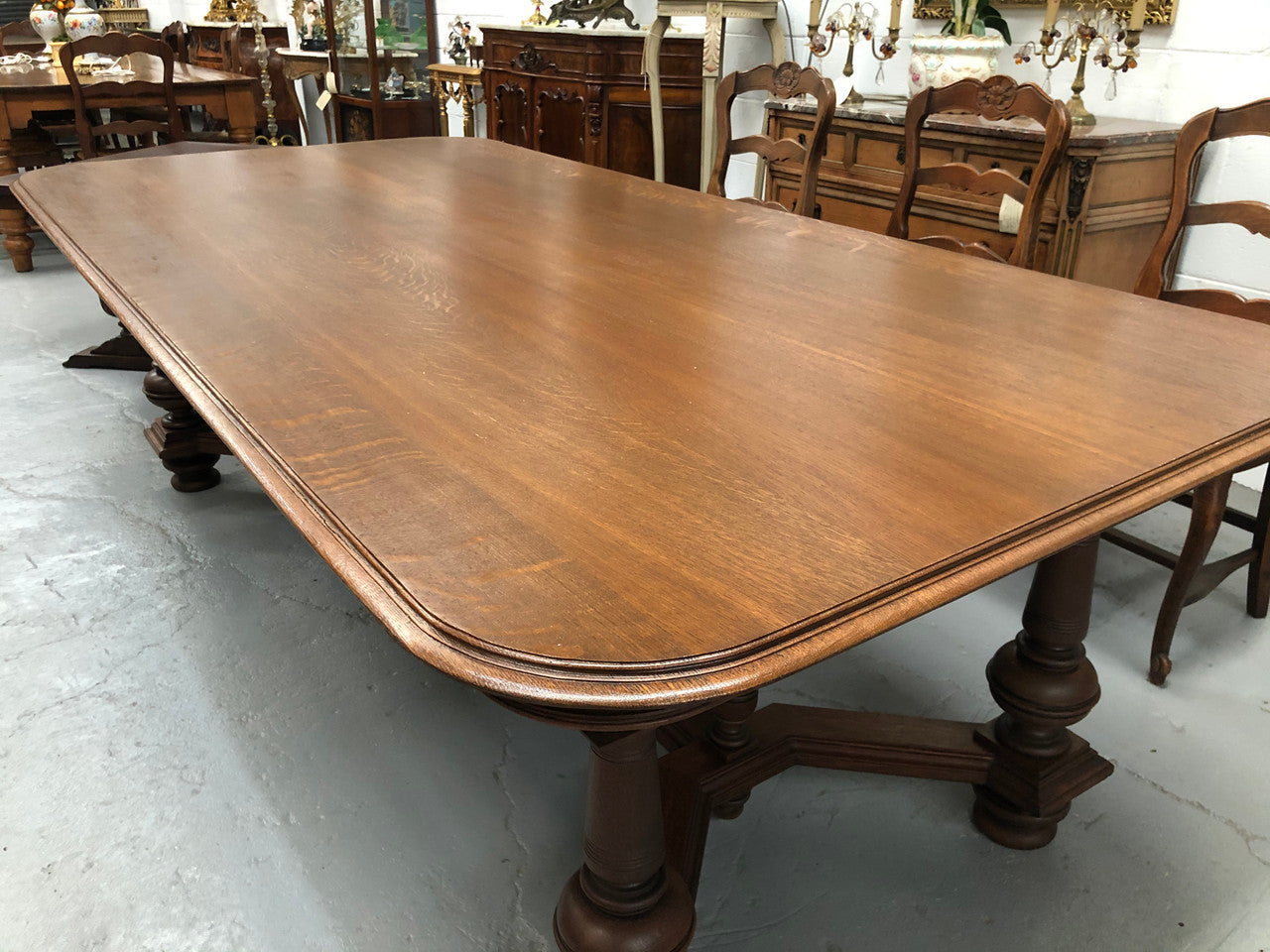 Large French Oak 19th century Henry II style dining table. It can seat 8 very comfortable and being very wide at 119 cm there is plenty of space to sit 10. In good original detailed condition.