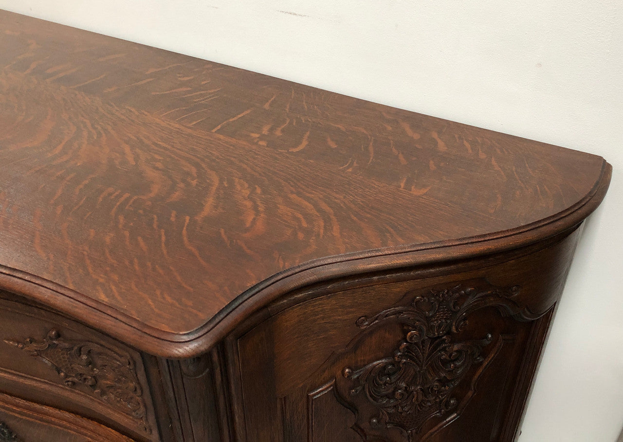 French Louis XV style dark Oak carved, two door and three drawer Commode /side cabinet. Could also be used as a TV cabinet or in the bedroom as storage very versatile. In good original detailed condition.