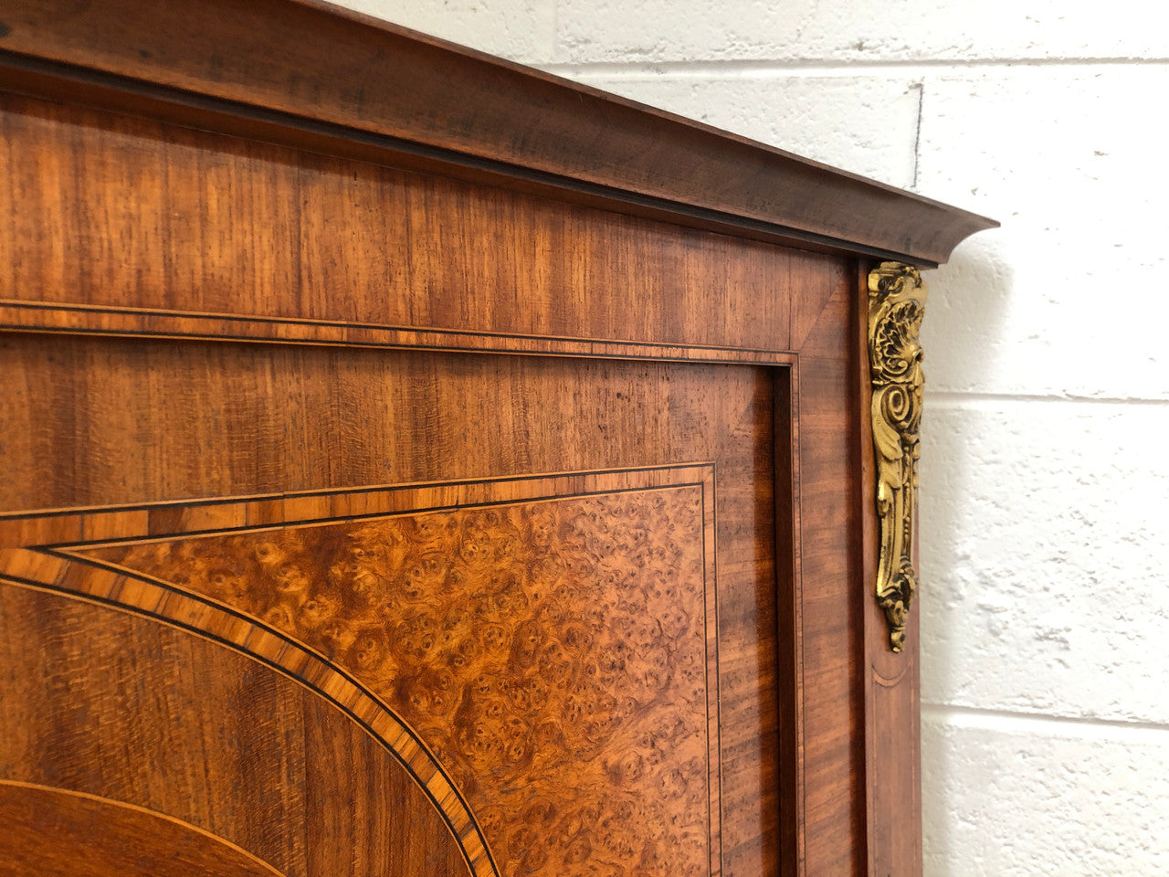 Beautiful Amboyna and Walnut Trumeau mirror. Has lovely parquetry inlay and is in good original condition.