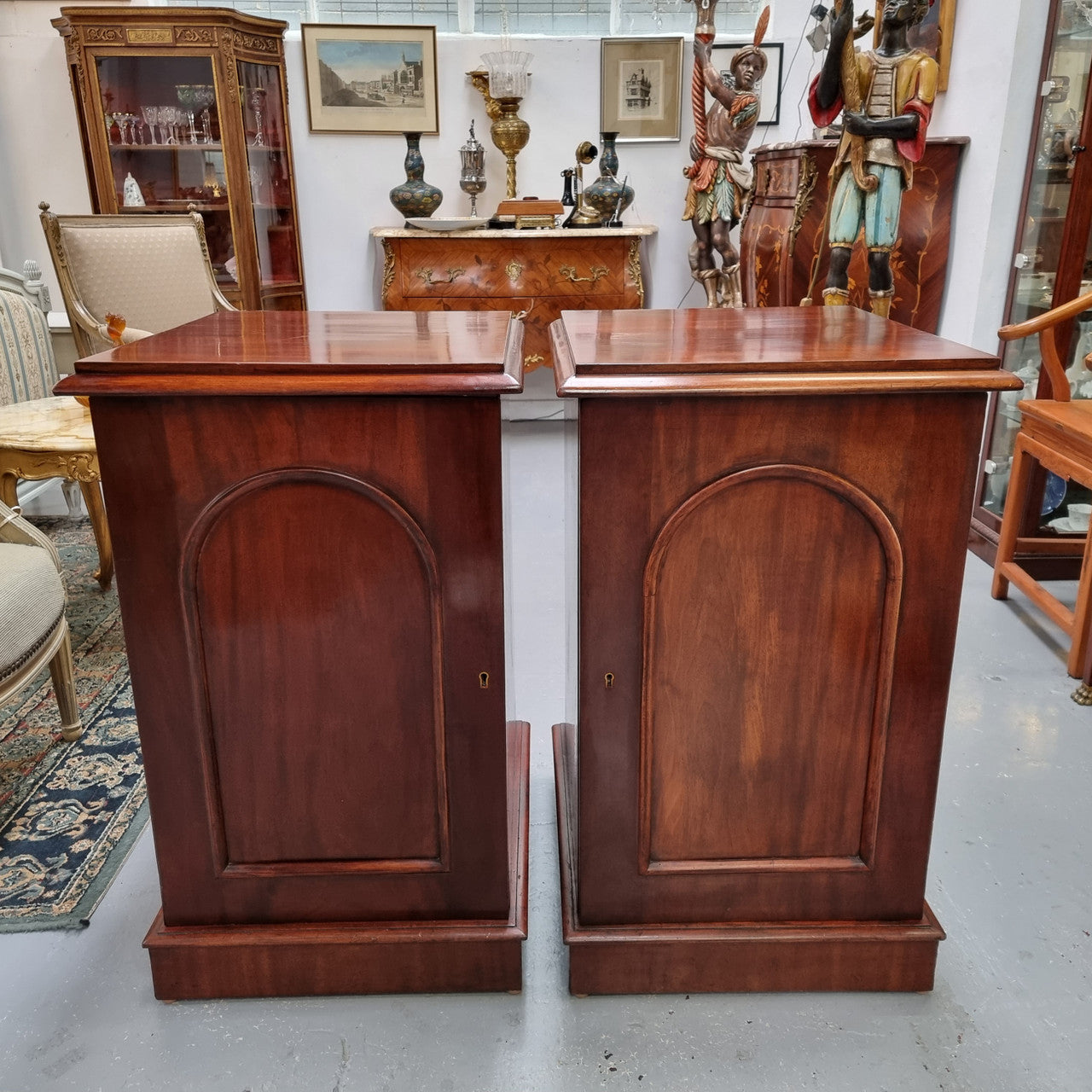 Unique pair of Victorian mahogany bedsides with one fixed shelf. Sourced locally and in good original detailed condition.