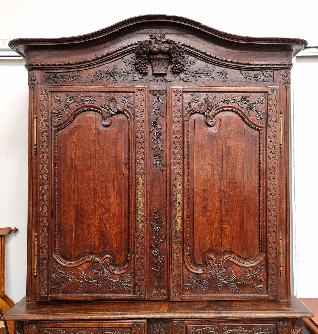 French Oak 18th Century superbly carved sideboard buffet. This amazing buffet has loads of character which is expected being circa 1790's. The top section has two fixed shelves and the bottom section has one fixed shelf. It has been sourced from France and is in good original detailed condition.